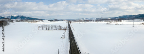 road trip across akan lake national park area in hokkaido in winter season photo