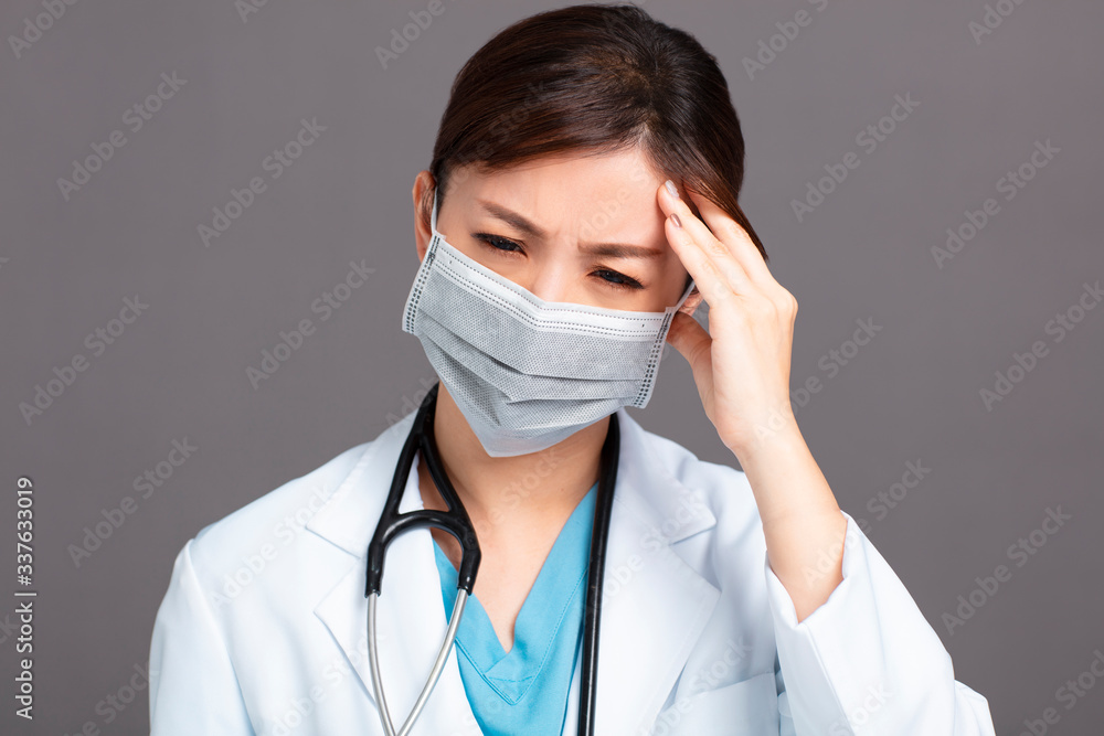 female doctor under tired, stress and headache female doctor under tired, stress and headache