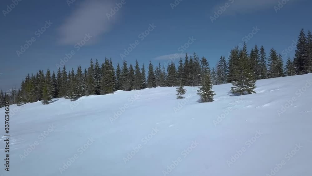 Flying over the traveler and Beautiful landscape of winter mountains. Aerial view. 4K Flying over the traveler and Beautiful landscape of winter mountains. Aerial view. 4K