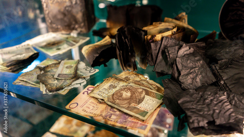 Tableau sur toile Warsaw, Poland - 25/ 01/ 2020: Burnt money Zloty exhibited at the Warsaw Museum of Money