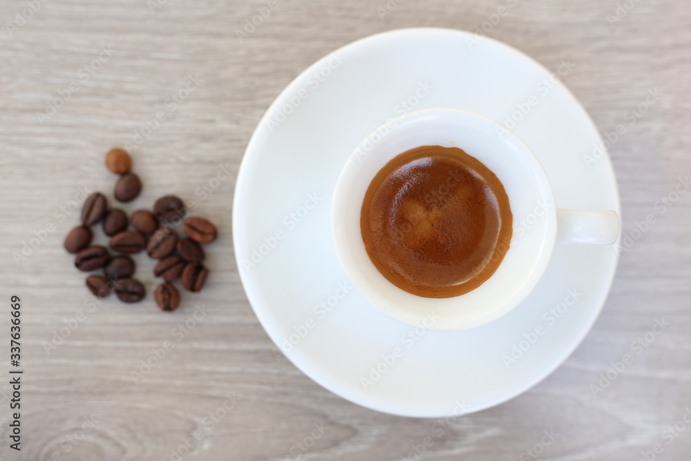 Coffee Bean and cup for wooden background Coffee Bean and cup for wooden background