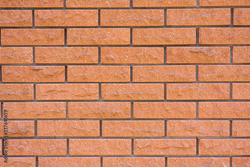The wall is made of bricks. Beautiful texture and background.