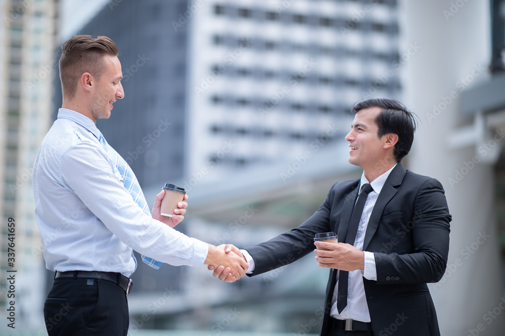 Businessman handshake hand with partner