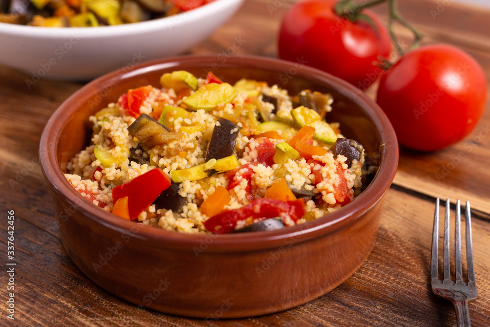 Cous cous with vegetables. oriental recipe that adapts to the characteristics of a vegan and vegetarian dish. Summer food, summer lunch. Cous cous with vegetables. oriental recipe that adapts to the characteristics of a vegan and vegetarian dish. Summer food, summer lunch.