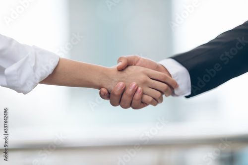Confidence of businessmen by handshake