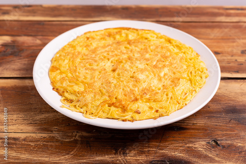 Homemade spaghetti omelette. Complete dish, nutritious and typically suitable for those who practice sports. Protein food, good fats food.