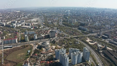 Establishing aerial shot over Chisinau, Moldova during daytime photo