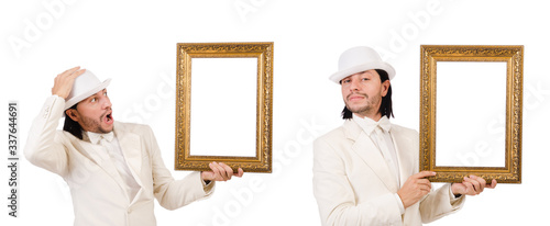 Man in white costume with picture frame photo