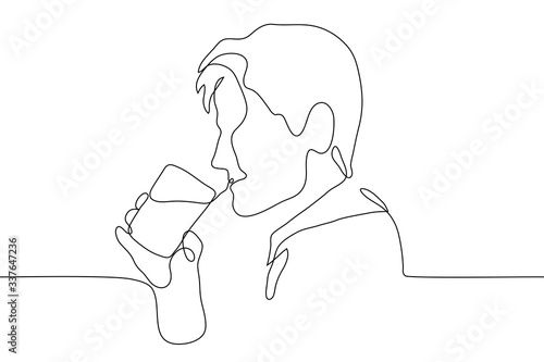 Portrait of a man in profile with a glass of drink brought to his mouth. One continuous line art guy is about to drink (water). It can be used for animation.