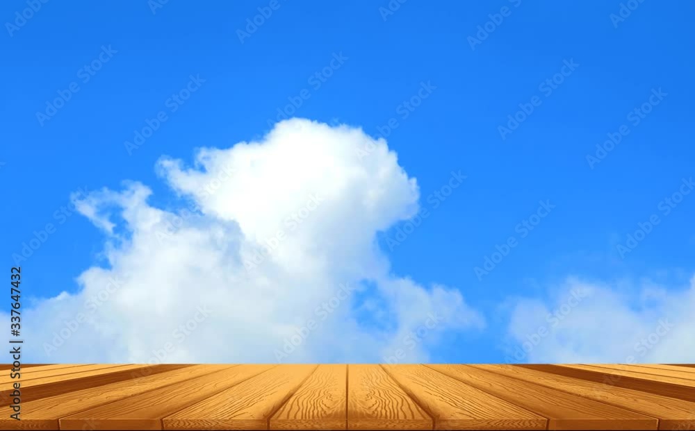 gold wood pieces floor and white cloud moving on blue sky gold wood pieces floor and white cloud moving on blue sky