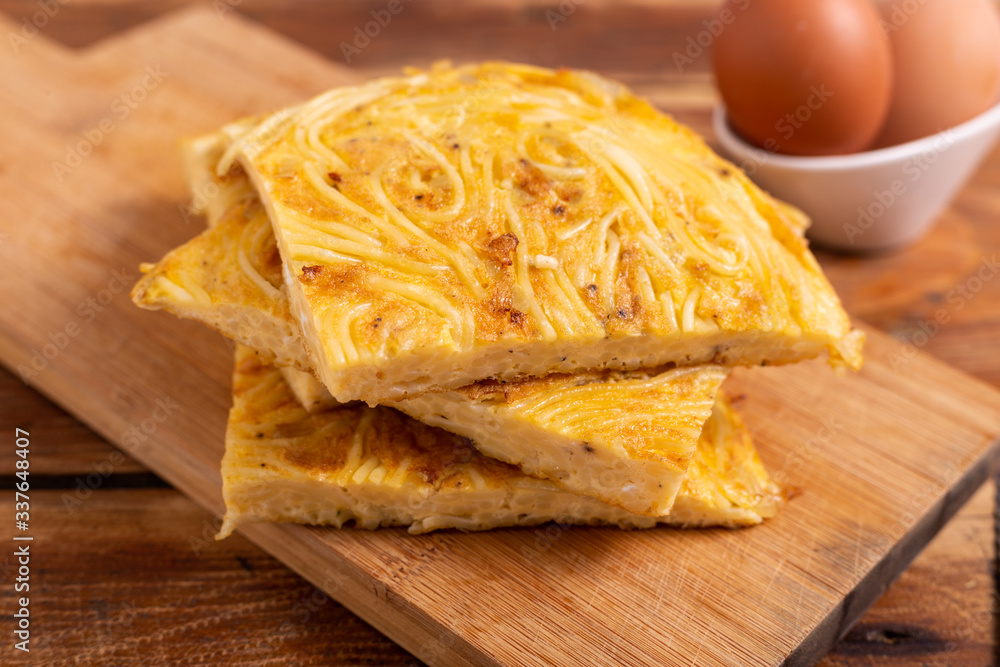 Homemade spaghetti omelette. Complete dish, nutritious and typically suitable for those who practice sports. Protein food, good fats food.