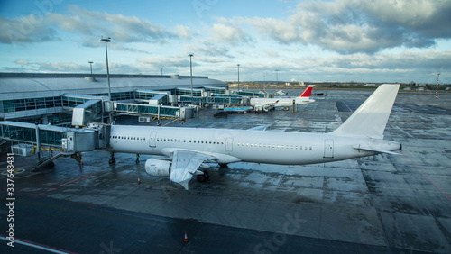 Airplane near the terminal ...