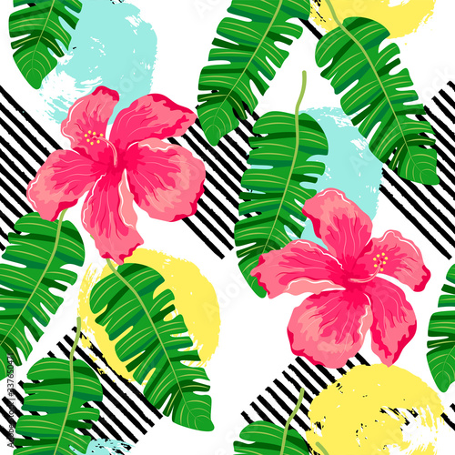 Tropical exotic leaves, hibiscus flowers with hand drawn style blots and stripes. Seamless pattern. Vector illustration.