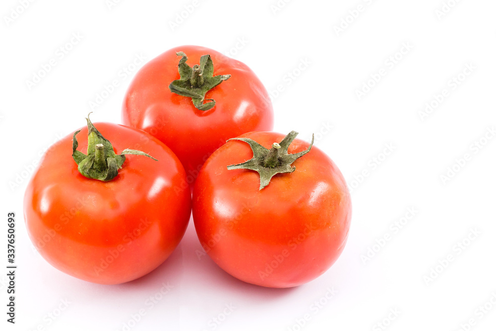 red ripe tomatoes isolated on white background red ripe tomatoes isolated on white background