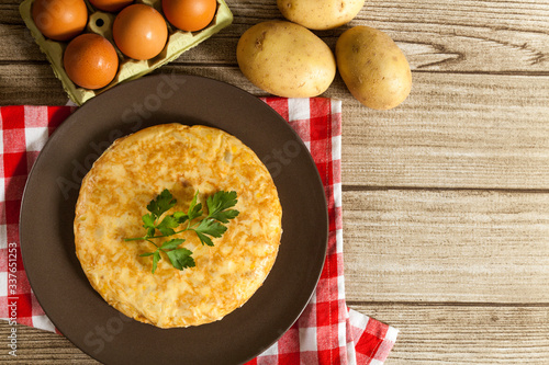 Spanish omelette and ingredients top view