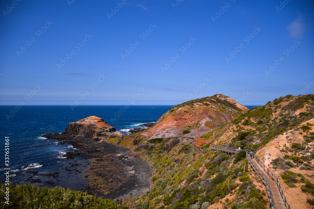 The mountain near the coast of the sea with clear blue sky background in Australia