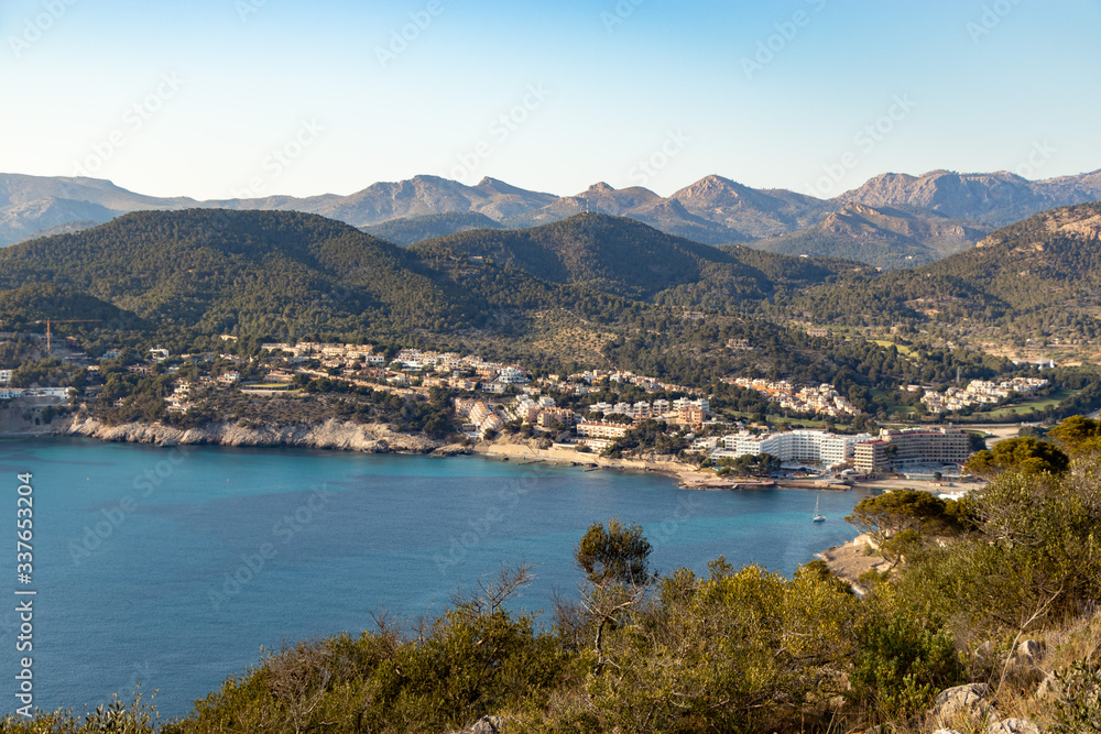 aerial view over the bay of camp de mar during sunset from the view point cap andritxol, mallorca, Spain