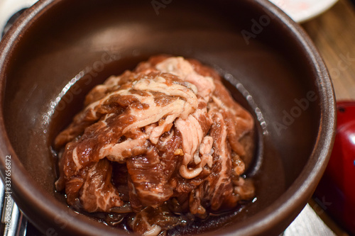 The raw meat with in the wooden bowl in the restaurant in Melbourne, Australia
