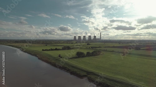 Aerial pan shot over the river trent looking towards Willington power station photo