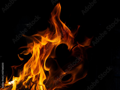 Hot fire with flames and black background