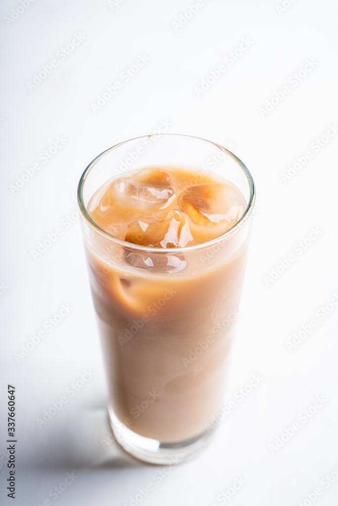 Iced coffee with cream on the rustic background. Selective focus. Shallow depth of field.
Iced coffee with cream on the rustic background. Selective focus. Shallow depth of field.