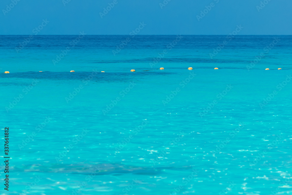 Abstract surface waves in blue water background