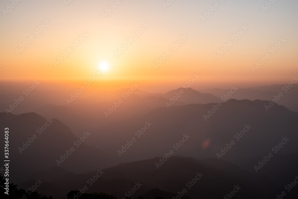 Twilight, sunrise and sea of fog in the morning on the mountains of northern Thailand, during the rainy season. Twilight, sunrise and sea of fog in the morning on the mountains of northern Thailand, during the rainy season.