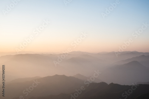 Wallpaper Mural Twilight, sunrise and sea of fog in the morning on the mountains of northern Thailand, during the rainy season. Torontodigital.ca