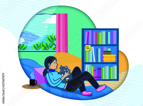 Woman laying on the sofa and playing with her cat. Practice social distance and stay home during coronavirus outbreak period.