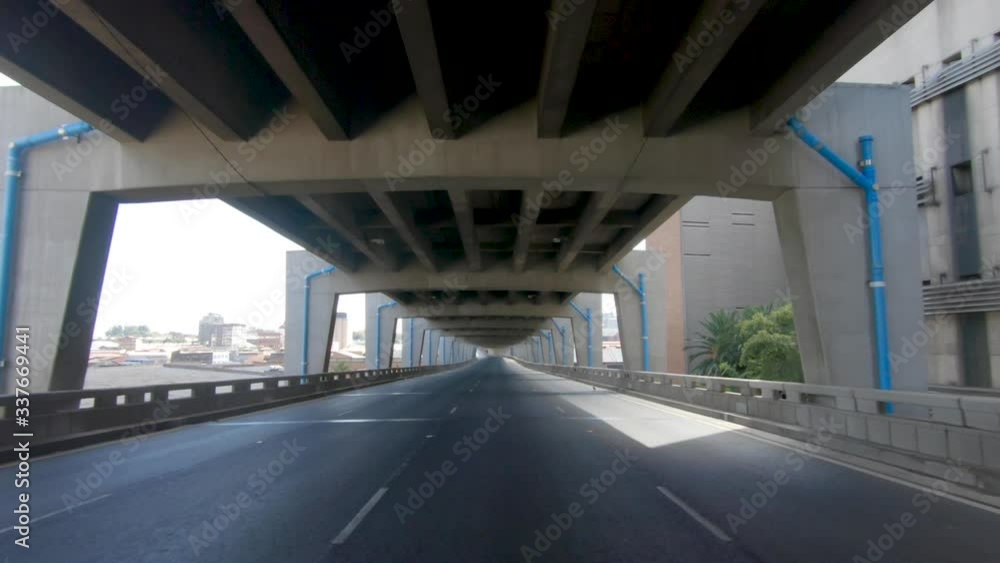 A tracking shot on the M1 Double-Decker highway in Johannesburg to show how empty and quiet the city is during the Covid-19 Coronavirus lockdown. A tracking shot on the M1 Double-Decker highway in Johannesburg to show how empty and quiet the city is during the Covid-19 Coronavirus lockdown.