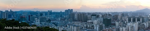 A dense cluster of buildings in the city.Panorama of Quanzhou, China. © may
