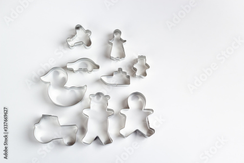 metal cookie cutters on white background