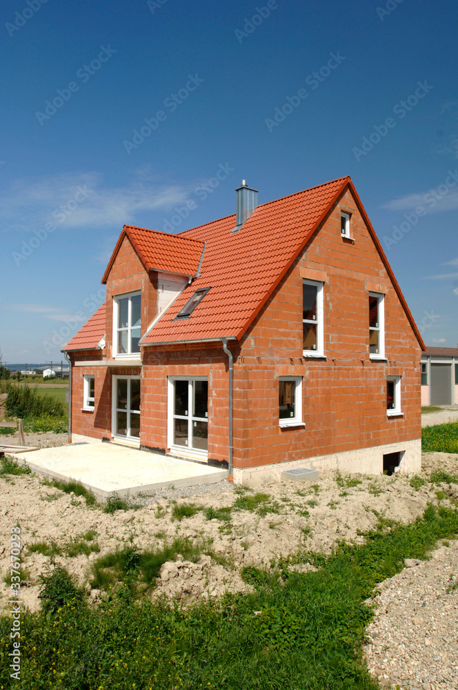 newly built house in construction newly built house in construction