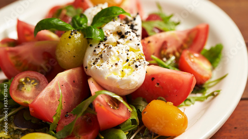 fresh salad with tomatoes and mozzarella