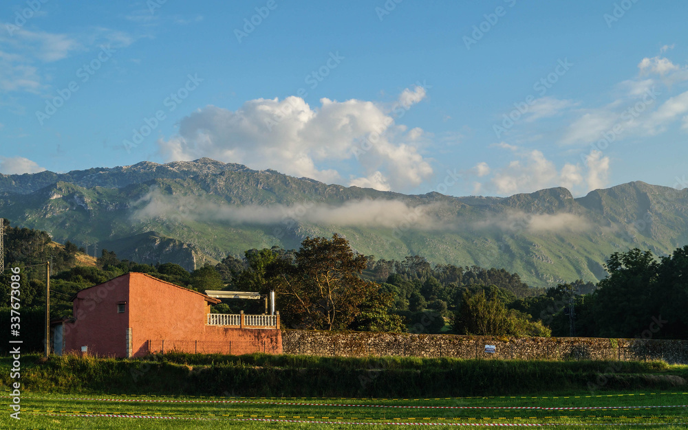 mountain landscape with barn