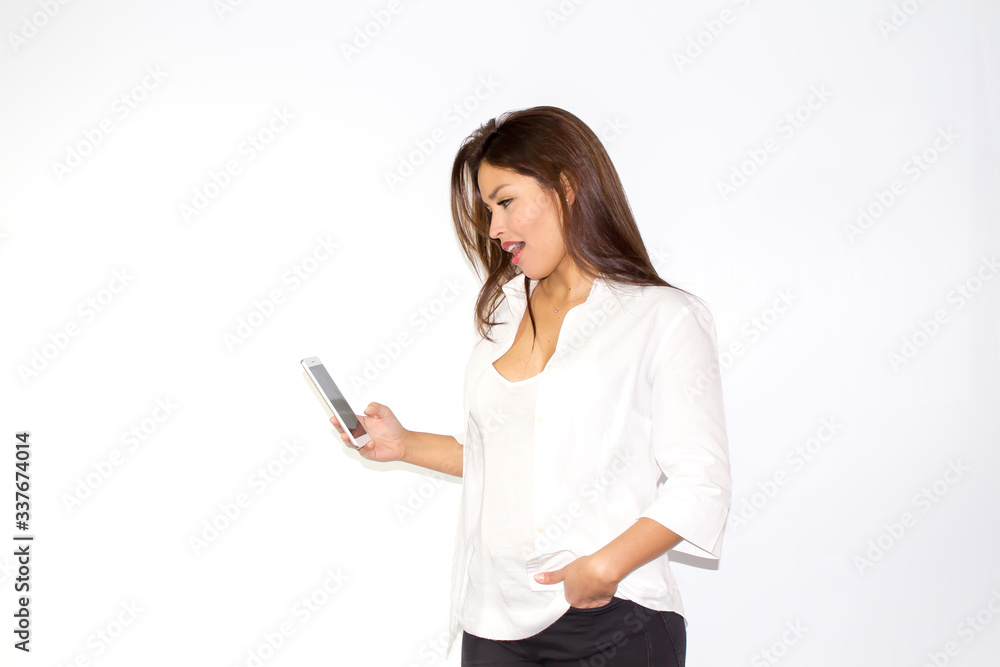 Beautiful latina girl speaks on the phone smiling and be charming Beautiful latina girl speaks on the phone smiling and be charming