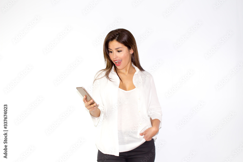 Beautiful latina girl speaks on the phone smiling and be charming