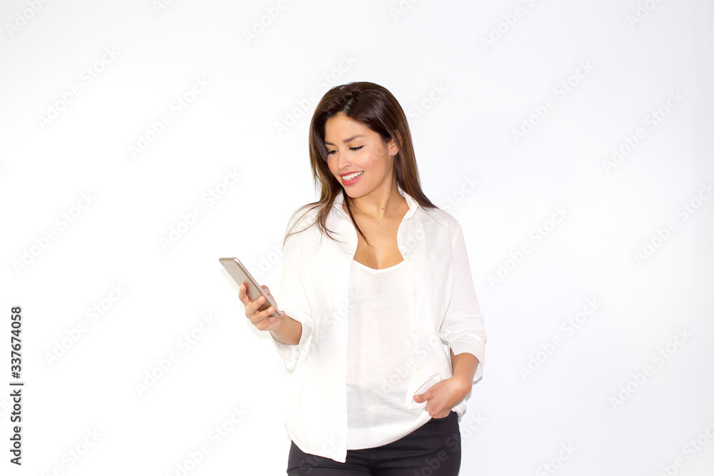 Beautiful latina girl speaks on the phone smiling and be charming Beautiful latina girl speaks on the phone smiling and be charming