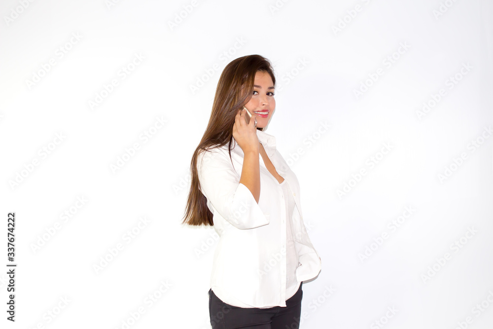 Beautiful latina girl speaks on the phone smiling and be charming Beautiful latina girl speaks on the phone smiling and be charming