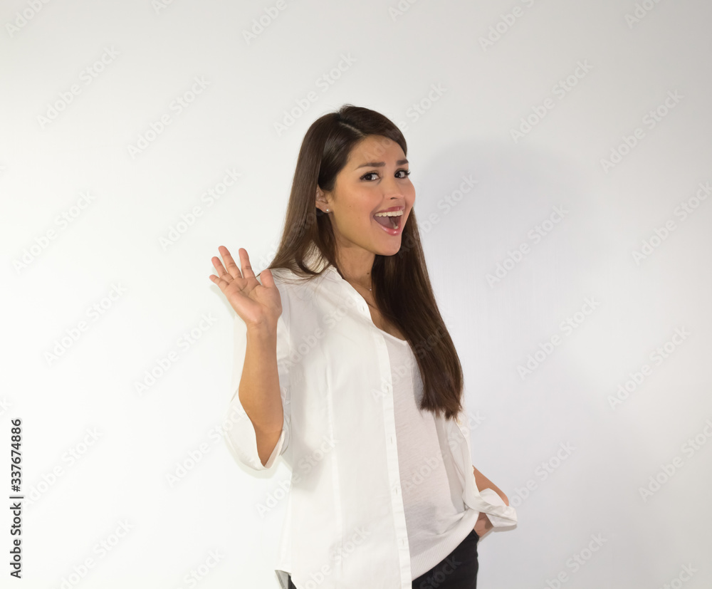 Surprised hispanic woman on white background Surprised hispanic woman on white background