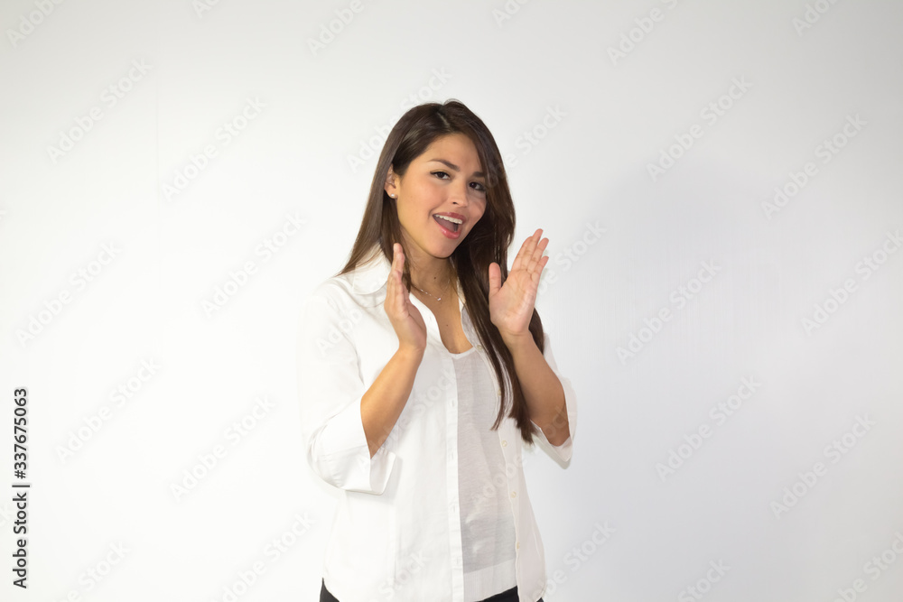 Surprised hispanic woman on white background Surprised hispanic woman on white background