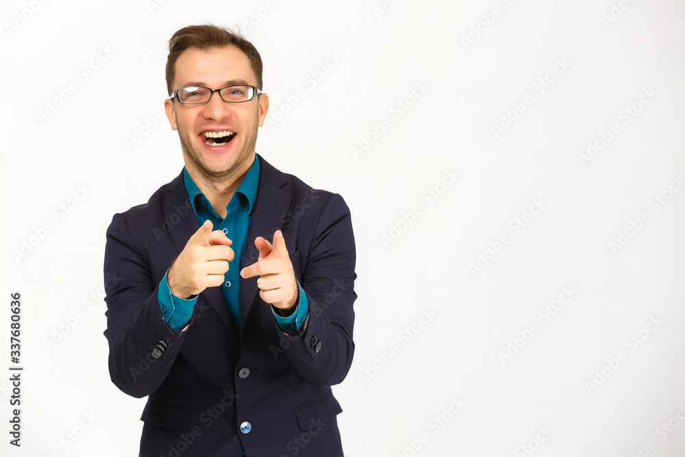 Man standing and presenting something above against white background Man standing and presenting something above against white background