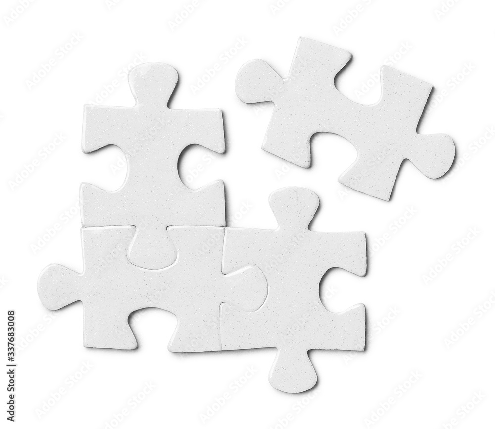 Close-up of puzzle pieces, isolated on white background Close-up of puzzle pieces, isolated on white background