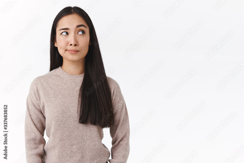 Skeptical, unsure attractive asian woman with long dark hair, have doubts and hesitation, making choice with uncertain expression, smirk bothered look suspicious upper right corner, concerned Skeptical, unsure attractive asian woman with long dark hair, have doubts and hesitation, making choice with uncertain expression, smirk bothered look suspicious upper right corner, concerned
