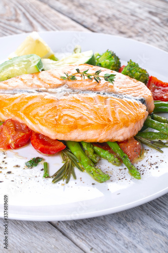 Grilled salmon steak butterfly with vegetables