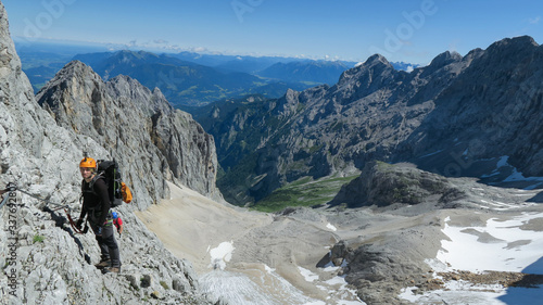 Passage via ferrata with a large exposure and an amazing view of the mountain range and the glacier