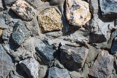 stone that are mixed with cement became stone concrete wall texture and background for web design and architect photo