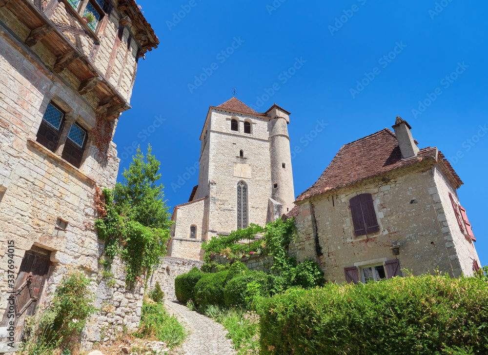 Street view of the old town of Saint-Cirq-Lapopie, one of the most beautiful villages in France (Les Plus Beaux Villages de France), Lot River valley department, Causses du Quercy Natural Park, France