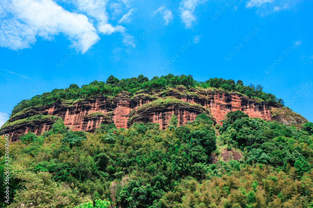 Danxia landform in China. Mountain forest pictures.
