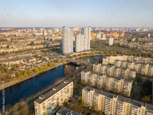 Residential area Rusanovka in Kiev in the evening sunshine. Aerial drone view. photo